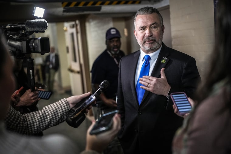 Rep. Don Bacon, R-Neb., speaks to reporters on his way to a closed-door GOP caucus meeting at the U.S. Capitol Jan. 10, 2023.