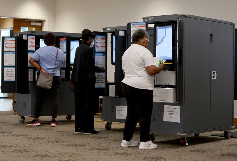 People cast their ballots during the Georgia primary at the Metropolitan Library in Atlanta