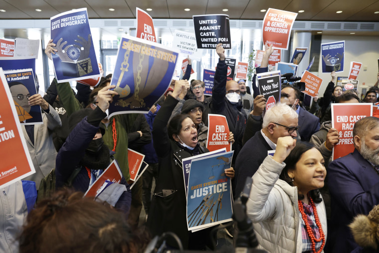 Supporters and opponents of a proposed ordinance to add caste to Seattle's anti-discrimination laws protest at a rally at Seattle City Hall, Tuesday, Feb. 21, 2023, in Seattle. Council Member Kshama Sawant proposed the ordinance.
