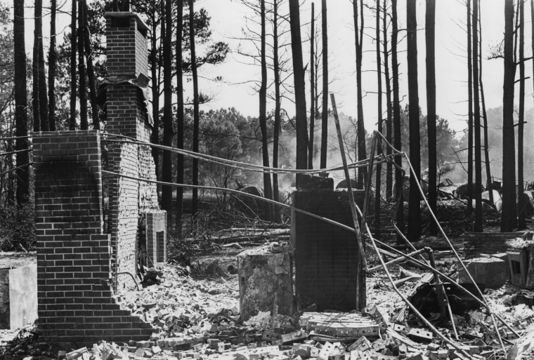 Image: The shell of a destroyed home after the train derailment in Livingston 1982.