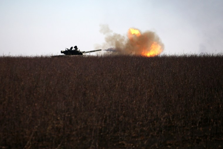 A Ukrainian tank fires toward Russian position near the town of Bakhmut, Donetsk region on January 26, 2023, amid the Russian invasion of Ukraine.