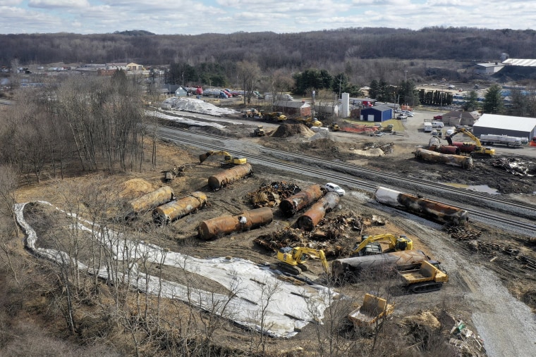 The cleanup continues on Feb. 24, 2023, at the site of of a Norfolk Southern freight train derailment in East Palestine, Ohio.