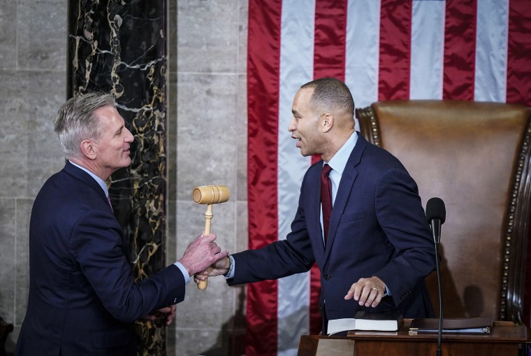 Hakeem Jeffries, D-N.Y., hands Kevin McCarthy, R-Calif., the speakers gavel in a meeting of the 118th Congress on Jan. 6, 2023, at the U.S. Capitol.