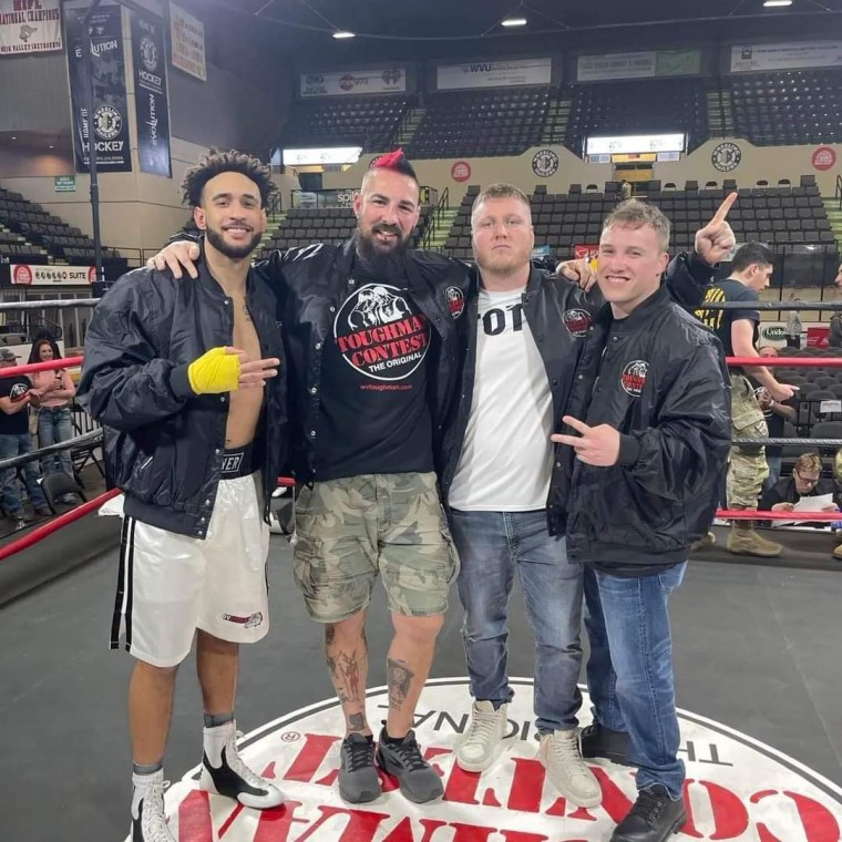Jonathan Haught, second from left, and fighters from Ohio Valley  MMA.