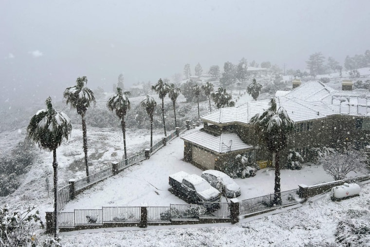 Snow covers a home in Rancho Cucamonga, California, on February 25, 2023. 