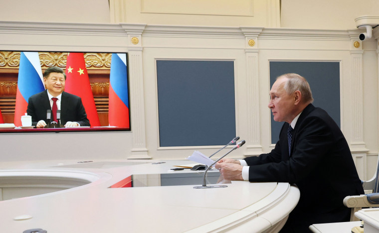 Russian President Vladimir Putin holds a video meeting with Chinese President Xi Jinping in Moscow