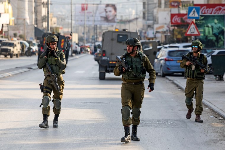 Security forces deploy in the occupied West Bank town of Huwara on Feb. 26, 2023.