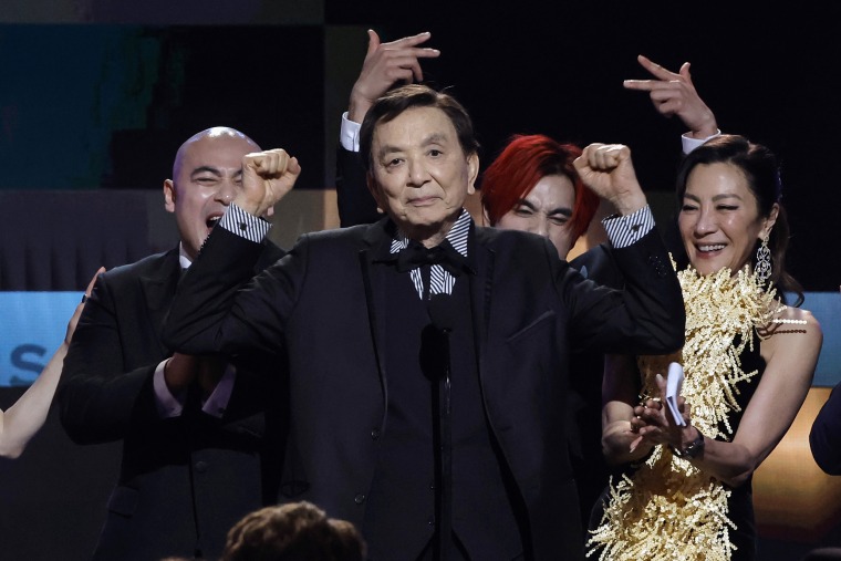 Brian Le, James Hong, Andy Le, and Michelle Yeoh accept the Outstanding Performance by a Cast in a Motion Picture award for "Everything Everywhere All at Once" at the 29th Annual Screen Actors Guild Awards on Feb. 26, 2023, in Los Angeles.