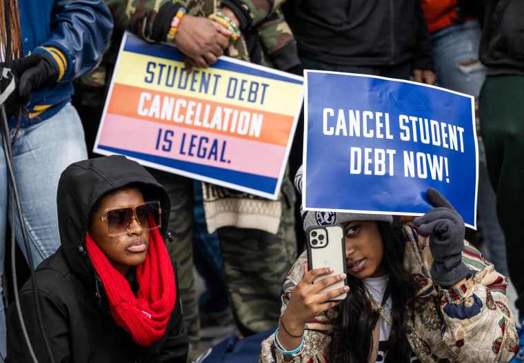 Student debt relief advocates gather in front of the Supreme Court on February 28, 2023.