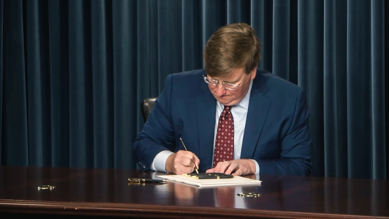 Republican Mississippi Gov. Tate Reeves signs House Bill 1125, Regulate Experimental Adolescent Procedures (REAP) Act.