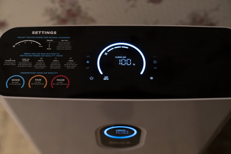 An air cleaner works in a living room on February 17, 2023 in Darlington, Pennsylvania.