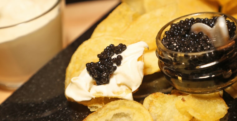 White truffle chips with creme fraiche, and Tsar Nicoulai Caviar.
