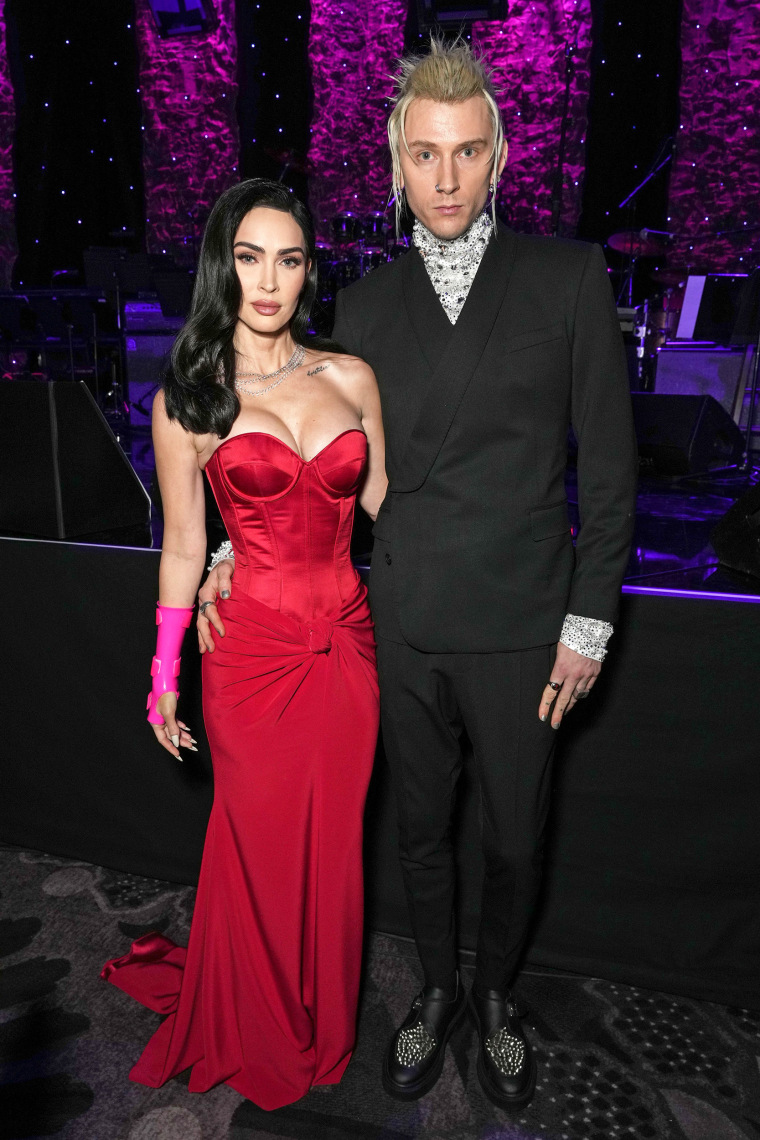 Megan Fox Attends Pre-Grammys Gala With Broken Wrist, Neon Pink Cast