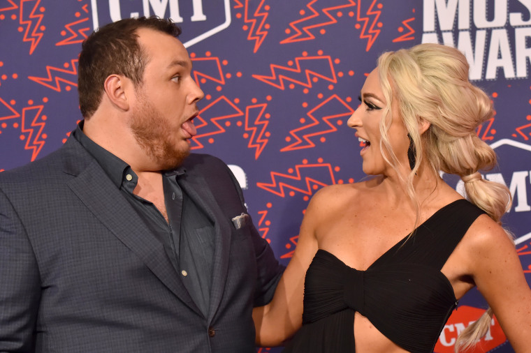  Luke Combs and Nicole Hocking attend the 2019 CMT Music Awards.
