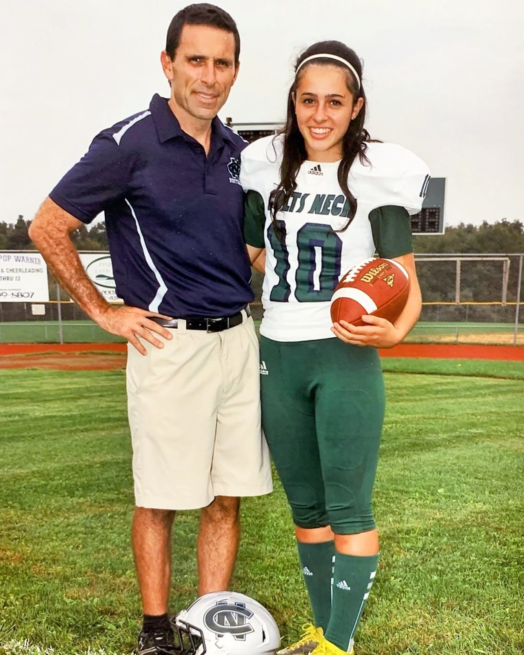 Letson with her dad, who also coached the team.