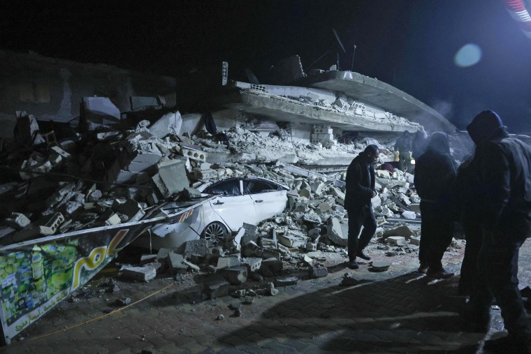 A collapsed building in Azmarin, near the Turkish border in the Syria's rebel-held northwestern Idlib province, early on Feb. 6, 2023. 