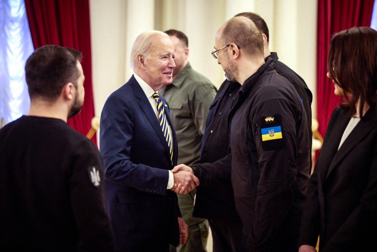Image: President Joe Biden shakes hands with Ukraine's Prime minister Denys Shmygal during a meeting with Ukrainian President Volodymyr Zelensky in Mariinsky Palace in Kyiv, Ukraine on Feb. 20, 2023.