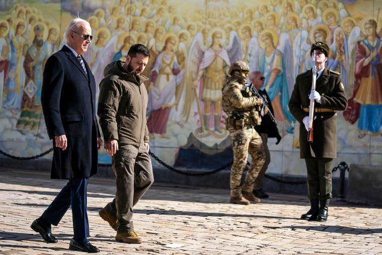 Image: President Joe Biden walks next to Ukrainian President Volodymyr Zelensky as he arrives for a visit in Kyiv, Ukraine on Feb. 20, 2023.