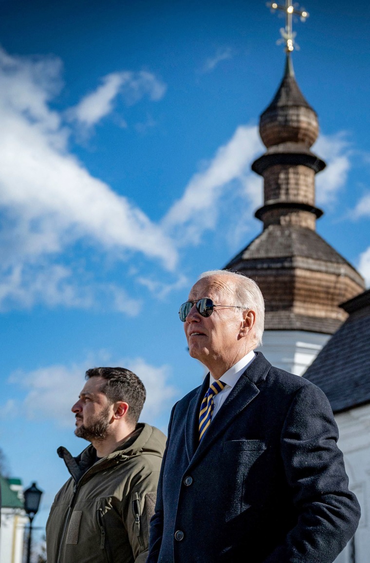 Image: President Joe Biden walks next to Ukrainian President Volodymyr Zelensky in front of St. Michaels Golden-Domed Cathedral as he arrives for a visit in Kyiv, Ukraine on Feb. 20, 2023.