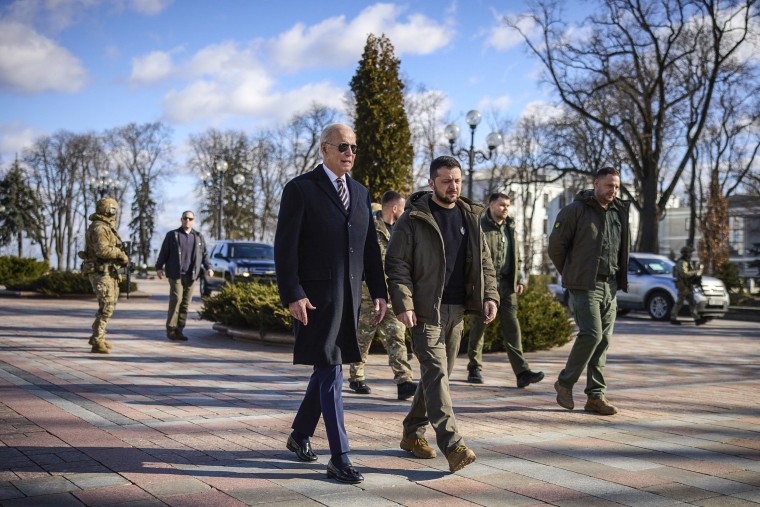 IMAGE: President Joe Biden, left, walks with Ukrainian President Volodymyr Zelensky during an unannounced visit, in Kiev, Ukraine, February 20, 2023. 