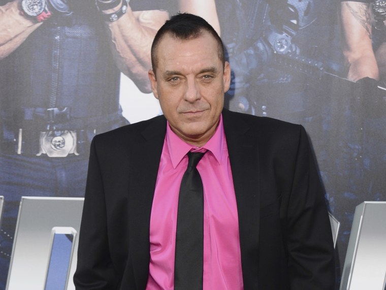 Tom Sizemore arrives at the premiere of "The Expendables 3" in Los Angeles. A stuntman who was pinned beneath an SUV driven by Tom Sizemore on a TV production has settled a lawsuit with the actor and Paramount Pictures. Court papers show a notice of settl