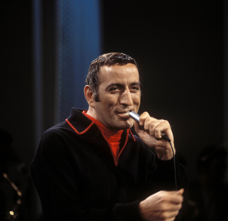 American singer Tony Bennett performs live on stage at Elstree Studios for an Associated Television (ATV) broadcast in 1962. 