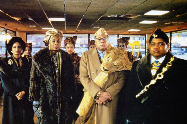 Sheila Johnson, Madge Sinclair, James Earl Jones, and Paul Bates in "Coming to America," 1988.