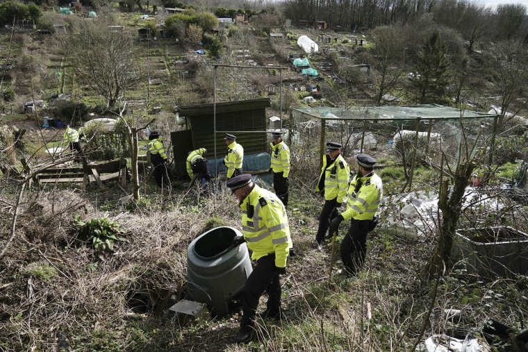 Police officers work in an urgent search operation to find the missing baby of Constance Marten, who has not had any medical attention since birth in early January, in Roedale Valley Allotments, in Brighton, Tuesday Feb. 28, 2023. Ms Marten and her partner Mark Gordon are in police custody after being arrested in Brighton. (Jordan Pettitt/PA via AP)