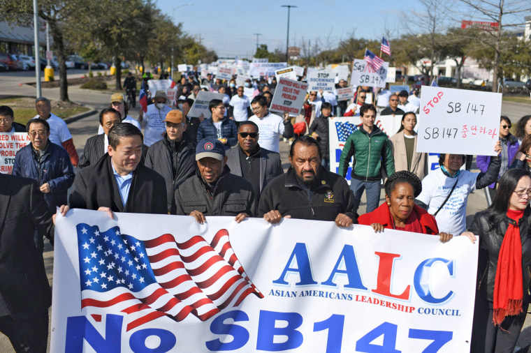 a protest in Houston against a bill that would forbid Chinese nationals from buying properties in Texas