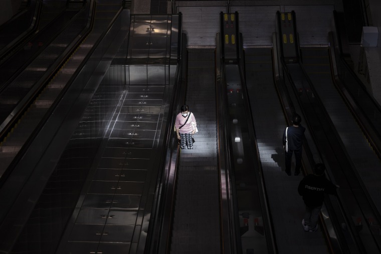 A passenger at a MTR subway station in Hong Kong on March. 1, 2023.