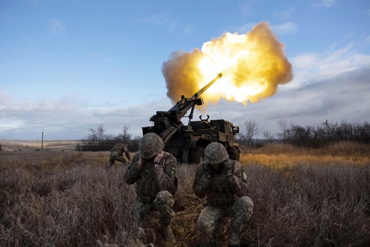 Ukrainian servicemen fire with a CAESAR self-propelled howitzer towards Russian positions in eastern Ukraine