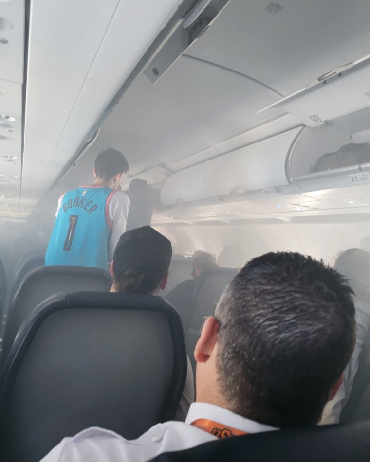 Smoke filled the cabin after the fire broke out in an overhead cabin.