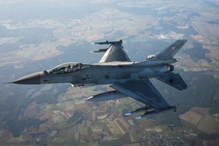 A F-16 Fighting Falcon flies during a NATO air shielding exercise in Lask, Poland