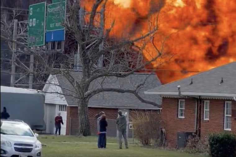 A fire burns following an explosive crash in U.S. 15 in Frederick, Md. 