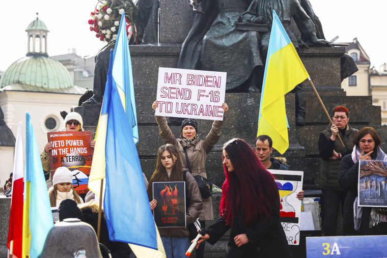Ukrainian citizens and supporters attend a demonstration of solidarity with Ukraine