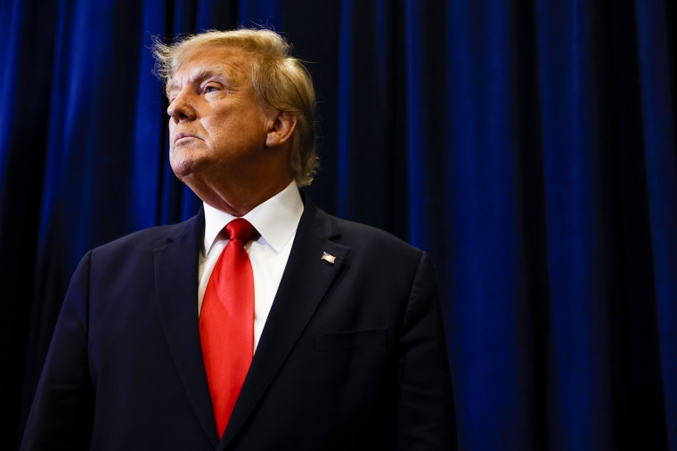 Former President Donald Trump speaks to reporters before his speech at the annual Conservative Political Action Conference in National Harbor, Md., on March 4, 2023.