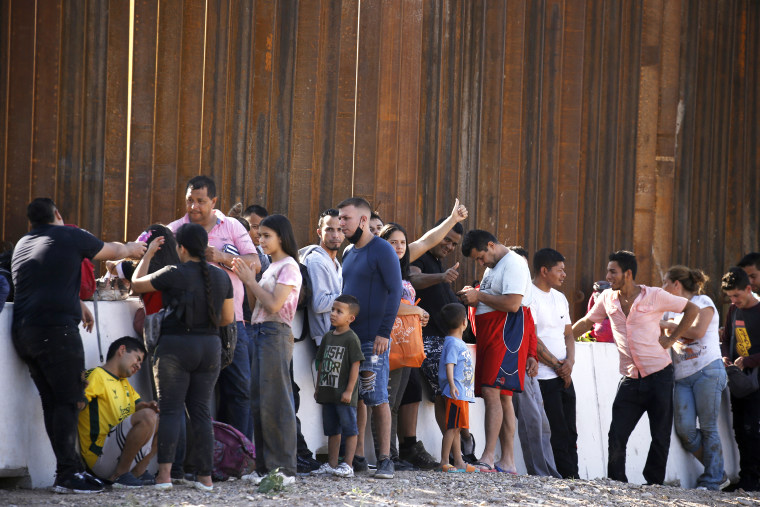 Migrants wait for US Border Patrol to be taken to a detention center on May 26 2022 in Eagle Pass Texas, USA. Title 42, the Trump era mandate which was set to prevent migrants from entering the US, was to expire on May 23 but was blocked by a lawsuit filed by several states citing that the move to strike down the law "failed to meet standards set by the Administrative Procedure Act" and that there is no permanent solution to handling the inevitable surge in immigration. Opponents to upholding of the law voiced their demands stating that Title 42 is illegal in that it violates immigration laws that prevents immigrants from their right to seek asylum. Since the implementation of Title 42 in March 2020, US Customs and Border Protection has effected "more than 1.8 million expulsions, mostly on the southern border of the US-Mexico Border".