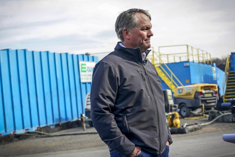 Image: Norfolk Southern President and CEO Alan Shaw speaks to reporters on Feb. 21, 2023, near the site where a freight train derailed Feb. 3 in East Palestine, Ohio.