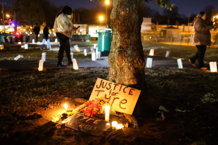 People attend a candlelight vigil for Tyre Nichols in Memphis on Jan. 26, 2023.