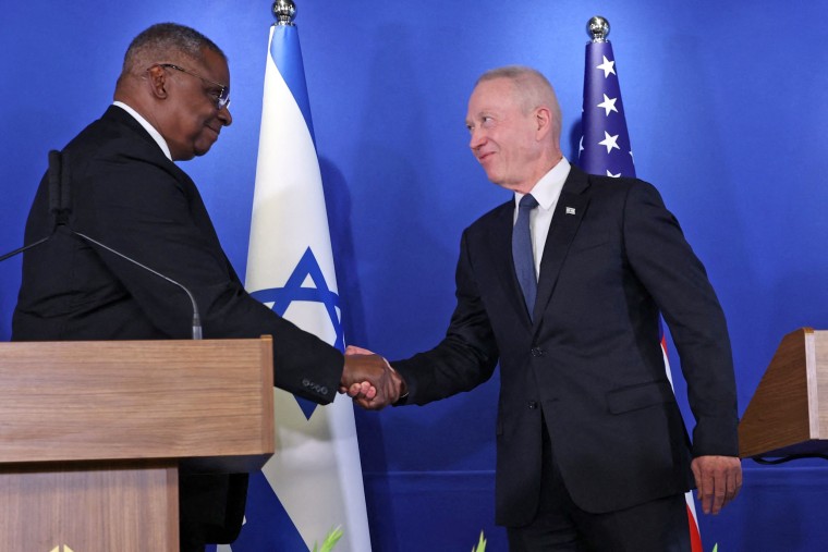  Defense Secretary Lloyd Austin shakes hands with his Israeli counterpart Yoav Gallant in Tel Aviv on March 9, 2023. 