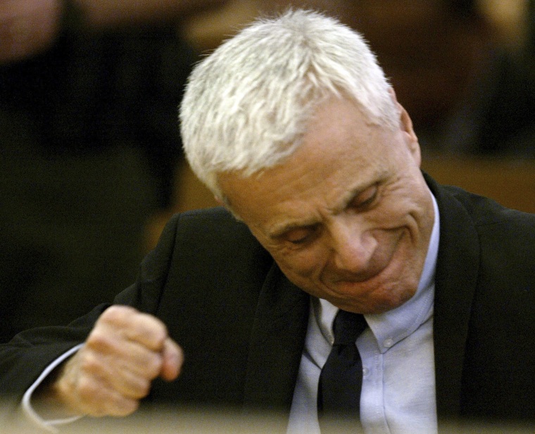 FILE - Robert Blake reacts after hearing the verdicts read in his murder trial for the death of his wife Bonny Lee Bakley in Los Angeles, March 16, 2005. Blake, the Emmy award-winning performer who went from acclaim for his acting to notoriety when he was tried and acquitted of murdering his wife, died Thursday, March 9, 2023, at age 89.