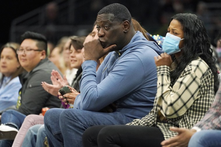 Former SuperSonics forward Shawn Kemp sits courtside at a Seattle Storm WNBA game in Seattle on May 18.