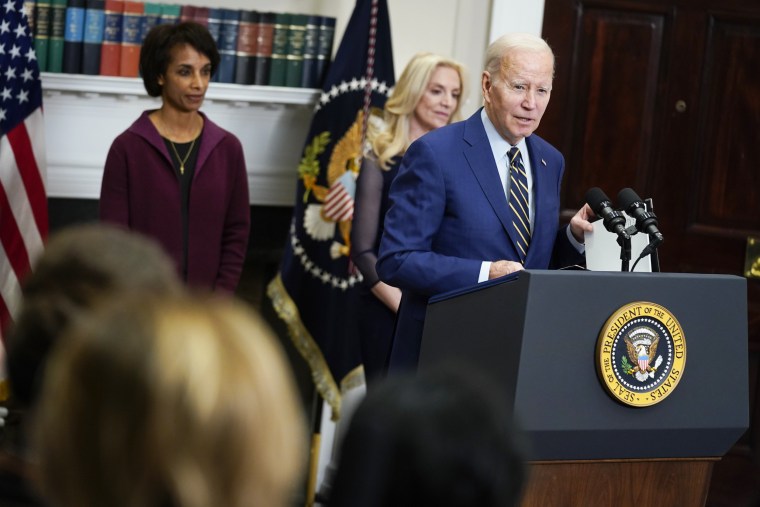 President Joe Biden speaks alongside Cecilia Rouse and Lael Brainard in the Roosevelt Room of the White House