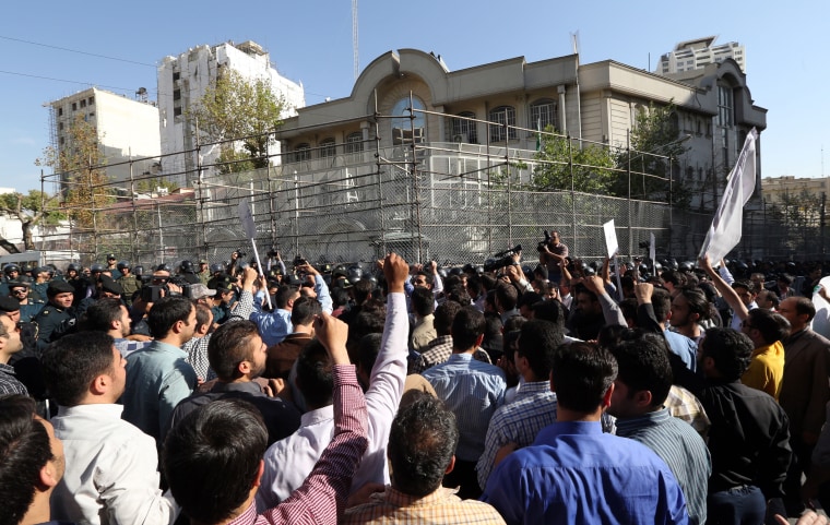 Iranian protesters shout slogans during a demonstration against Saudi Arabia outside its embassy in Tehran 