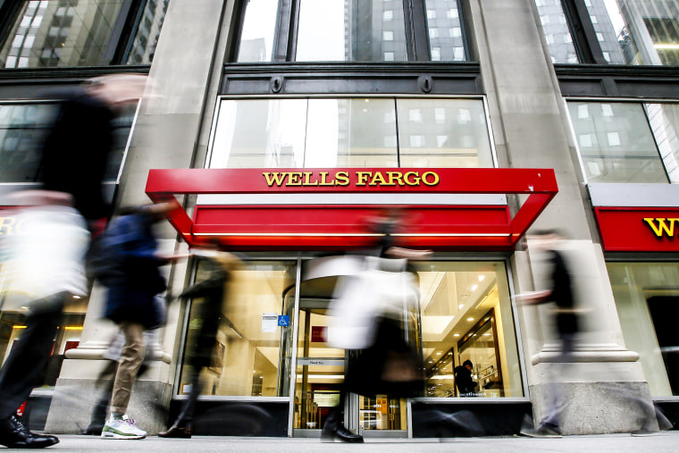 People walk past a Wells Fargo branch on Jan. 10, 2023 in New York.