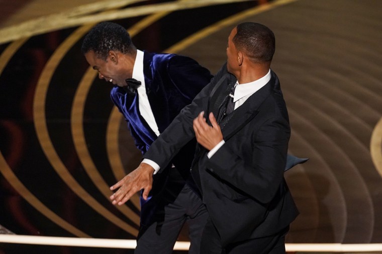 Will Smith slaps Chris Rock during the Oscars on March 27, 2022, in Los Angeles.
