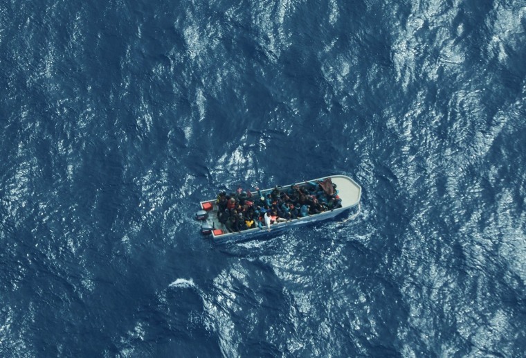 Migrants crowd a small vessel as they make the perilous journey from Libya to Italy on Saturday, according to the civilian reconnaissance team Sea-Watch.
