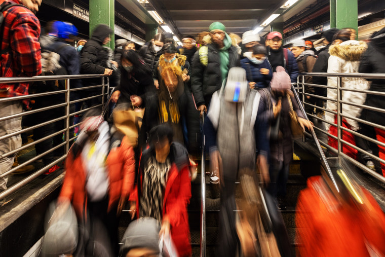 Commuters at the Times Square-42nd Street subway station in New York.