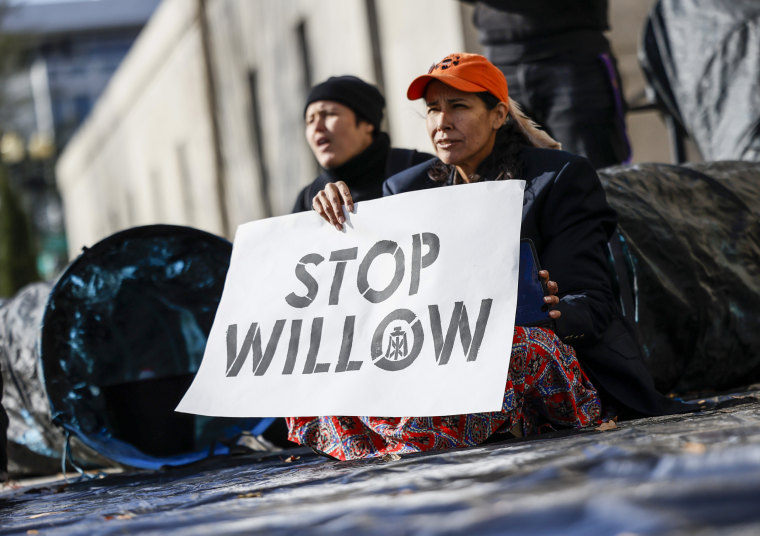 Climate activists protest the Willow Oil Project outside the U.S. Department of Interior on Nov. 17, 2022, in Washington.