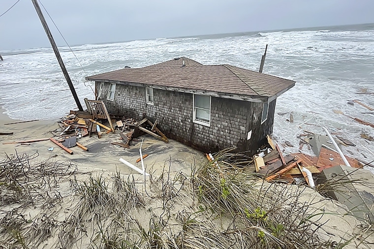 This photo provided by the National Park Service shows a collapsed one-story house in Rodanthe, N.C. (National Park Service via AP)